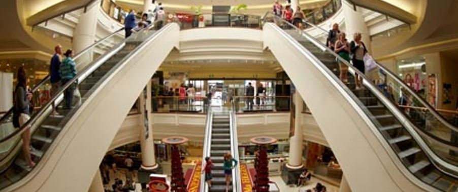 busy shopping at the Meridian Mall in Dunedin.